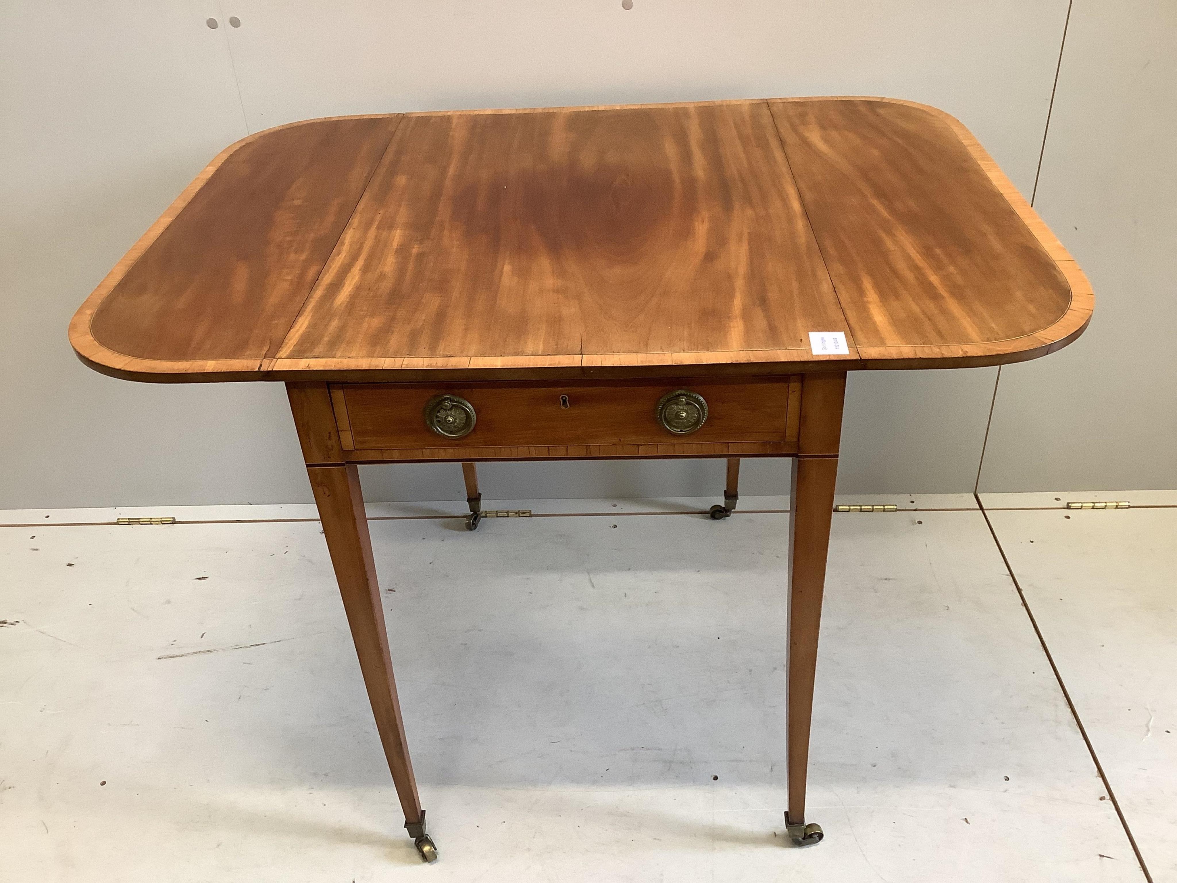 A George III satinwood banded mahogany Pembroke table, width 75cm, depth 55cm, height 76cm. Condition - good